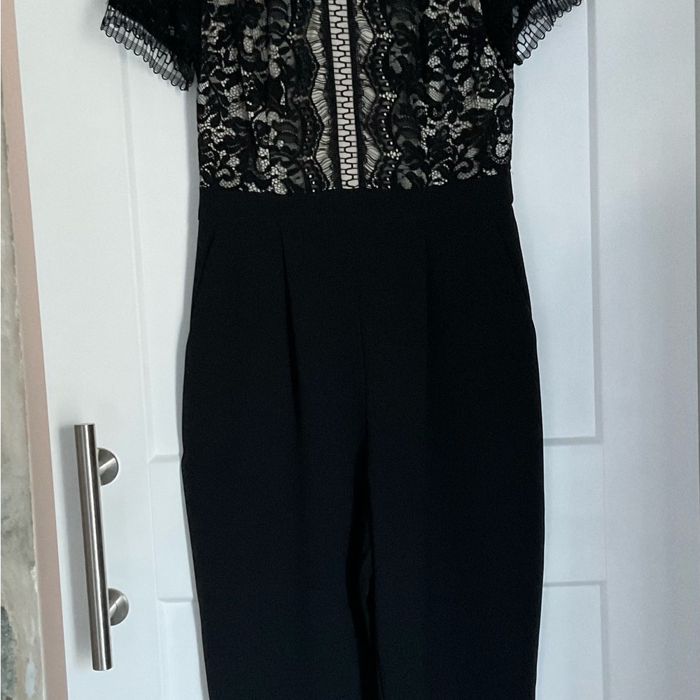Excellent condition size 8 Eliza J Lace bodice jumpsuit. Time to celebrate!